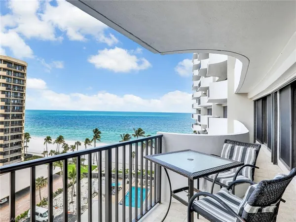 a view of a balcony dining area