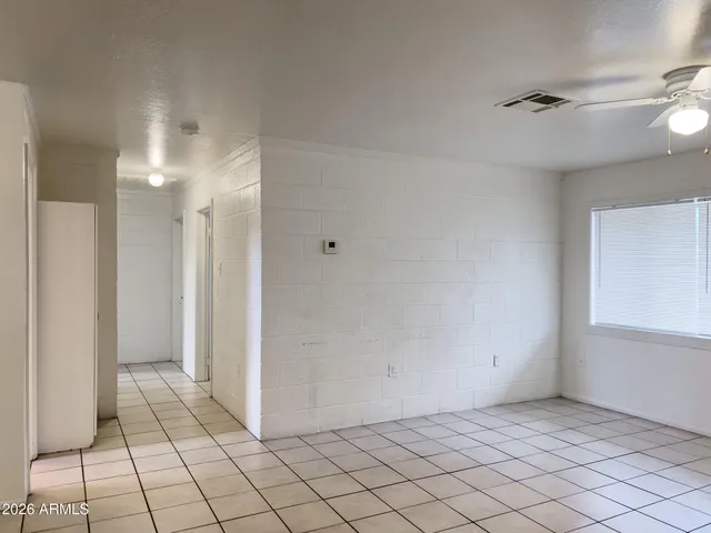 a kitchen with a sink and a refrigerator