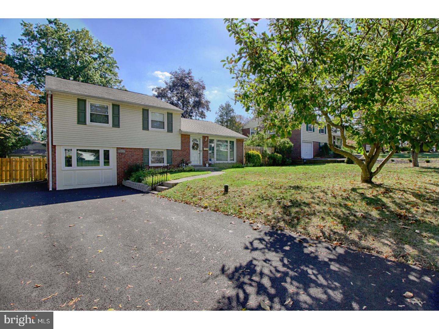 735 Rhoads Drive Springfield, PA 19064 - Photo 2 of 25 a view of a yard in front of house