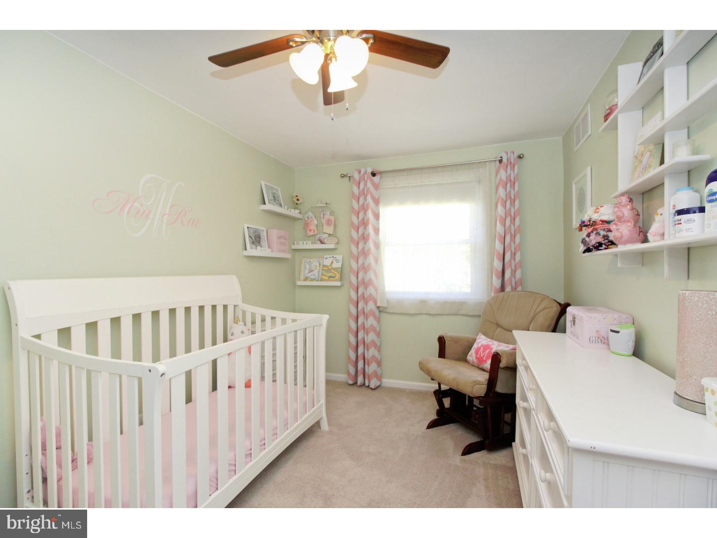 735 Rhoads Drive Springfield, PA 19064 - Photo 14 of 25 a bedroom with furniture and a window