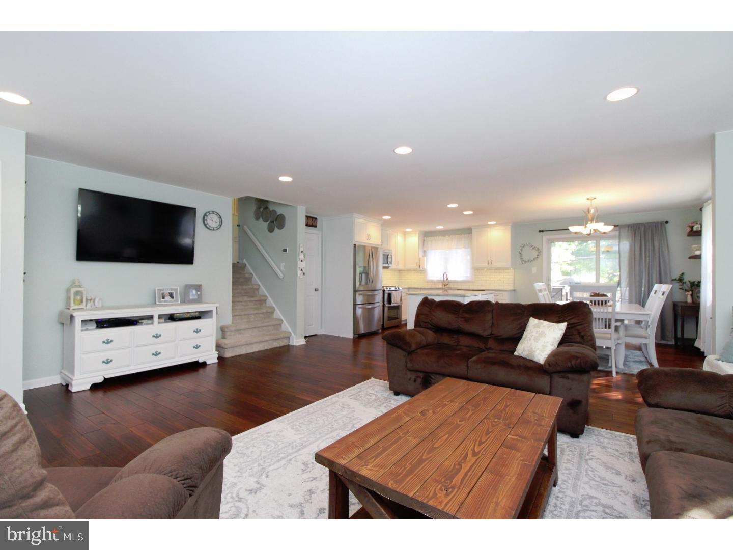735 Rhoads Drive Springfield, PA 19064 - Photo 5 of 25 a living room with furniture and a flat screen tv