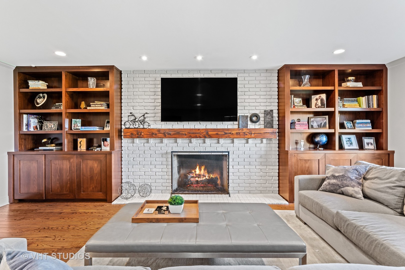 1850 South Ridge Road Lake Forest, IL 60045 - Photo 18 of 34 a living room with fireplace furniture and a flat screen tv