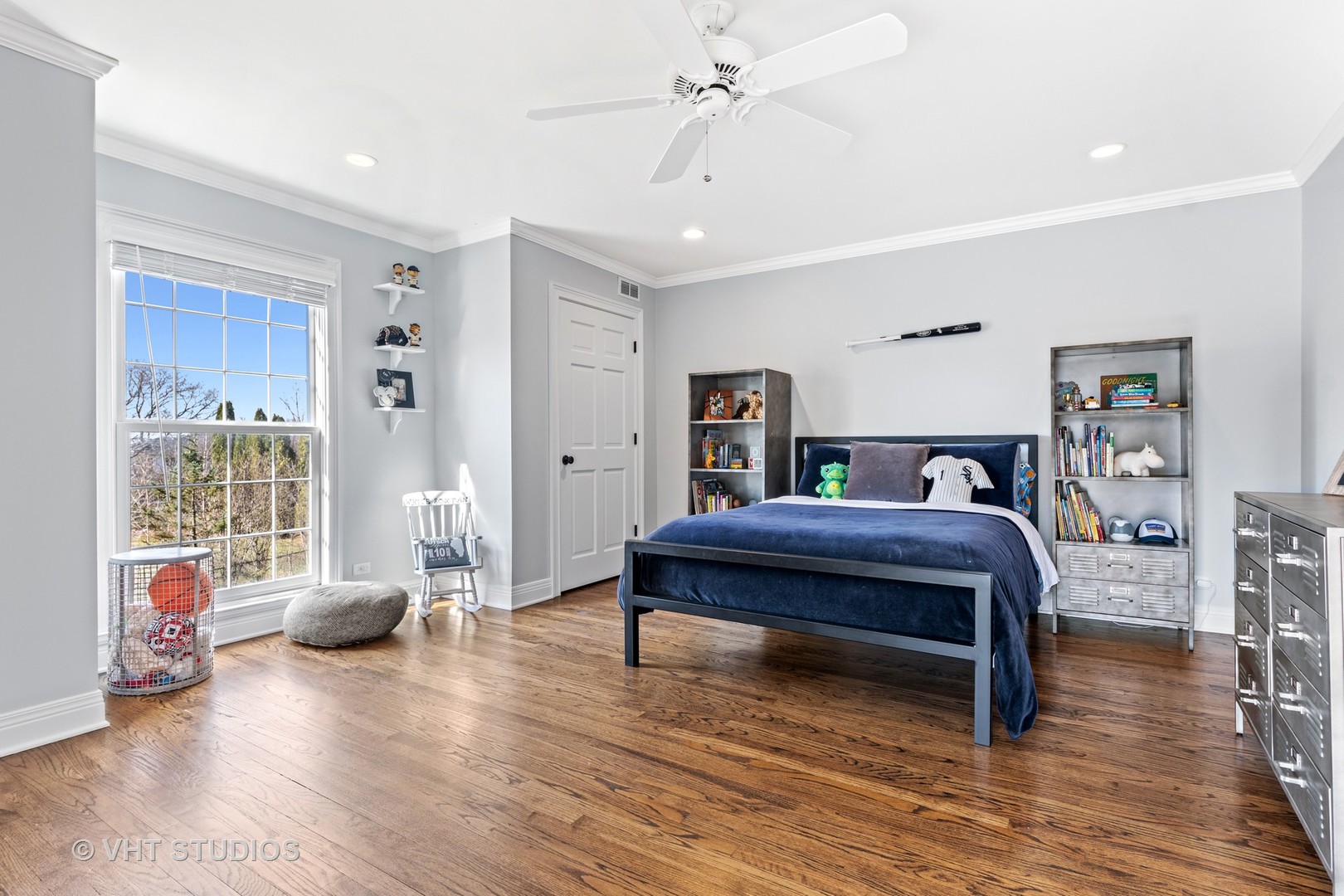 1850 South Ridge Road Lake Forest, IL 60045 - Photo 25 of 34 a bedroom with furniture and wooden floor