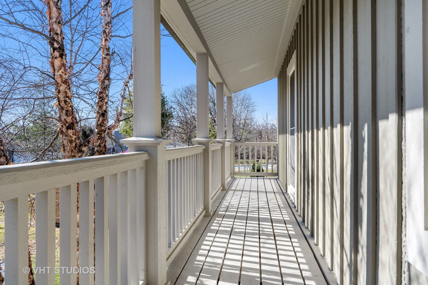 1850 South Ridge Road Lake Forest, IL 60045 - Photo 26 of 34 a view of a balcony with wooden floor and fence