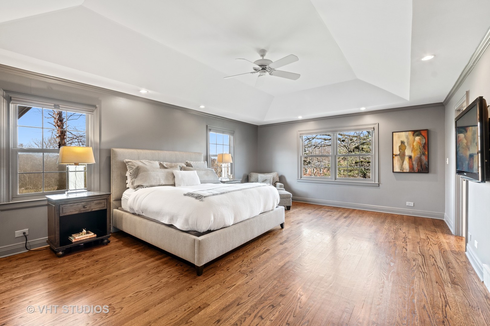 1850 South Ridge Road Lake Forest, IL 60045 - Photo 27 of 34 a spacious bedroom with a bed and a table