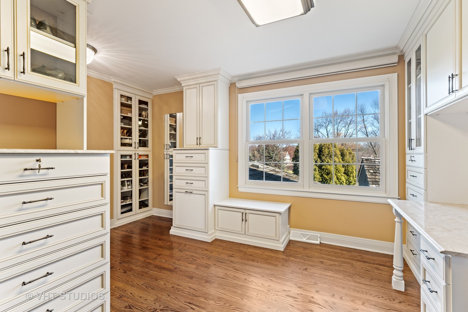 1850 South Ridge Road Lake Forest, IL 60045 - Photo 29 of 34 a view of walk in closet with clothes and shoes