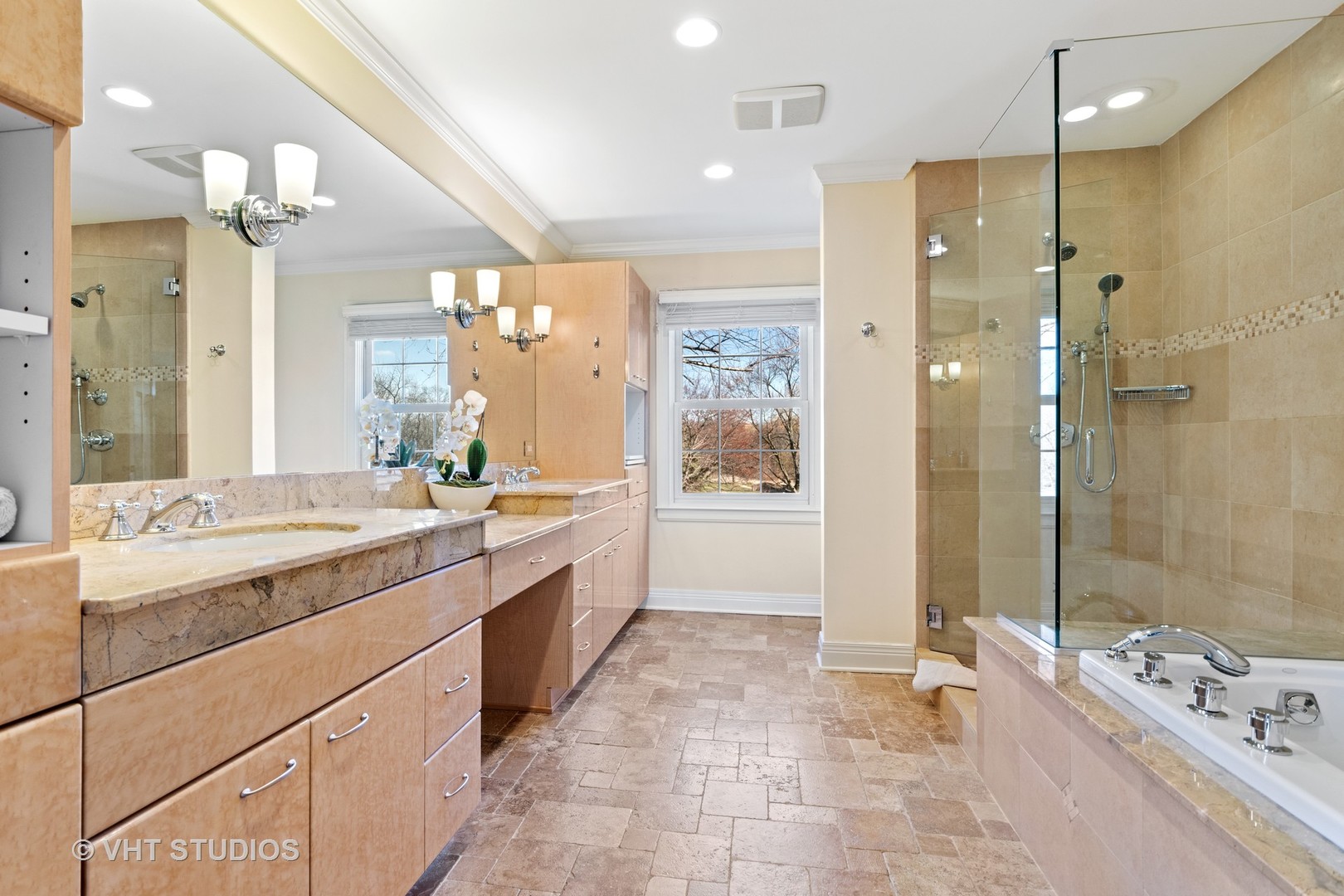1850 South Ridge Road Lake Forest, IL 60045 - Photo 30 of 34 a bathroom with a tub a sink shower and a mirror