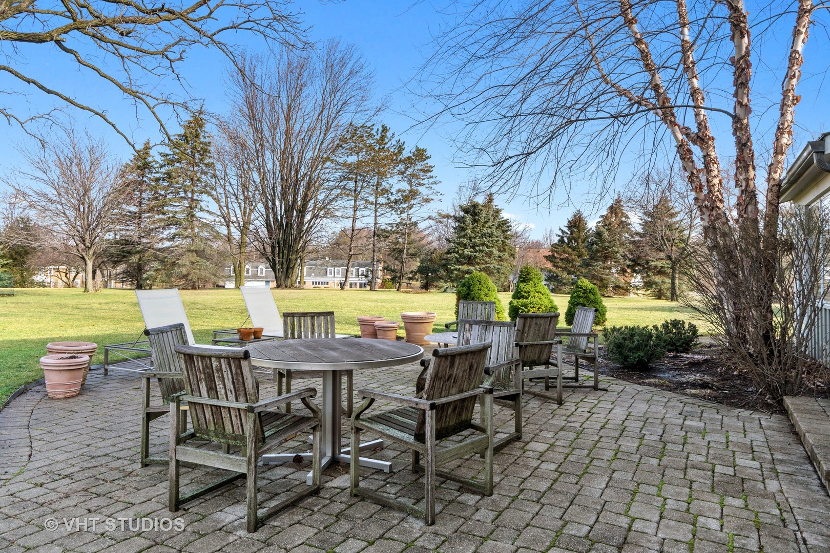1850 South Ridge Road Lake Forest, IL 60045 - Photo 3 of 34 a view of a patio with table and chairs and couches