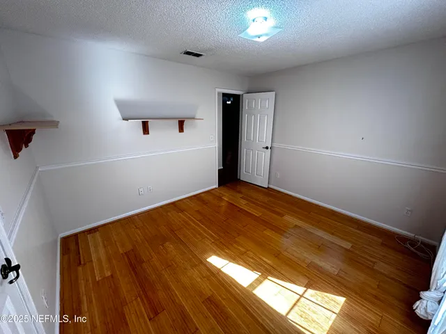 a view of a lake from a yard