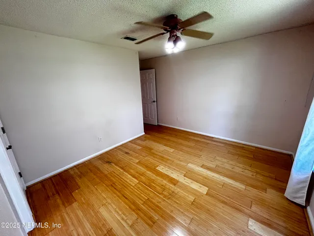 a bathroom with a sink a toilet and bathtub