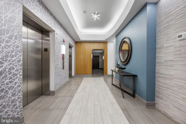 a view of hallway with washer and dryer
