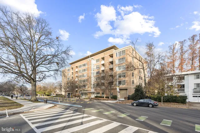 a view of a building and a street