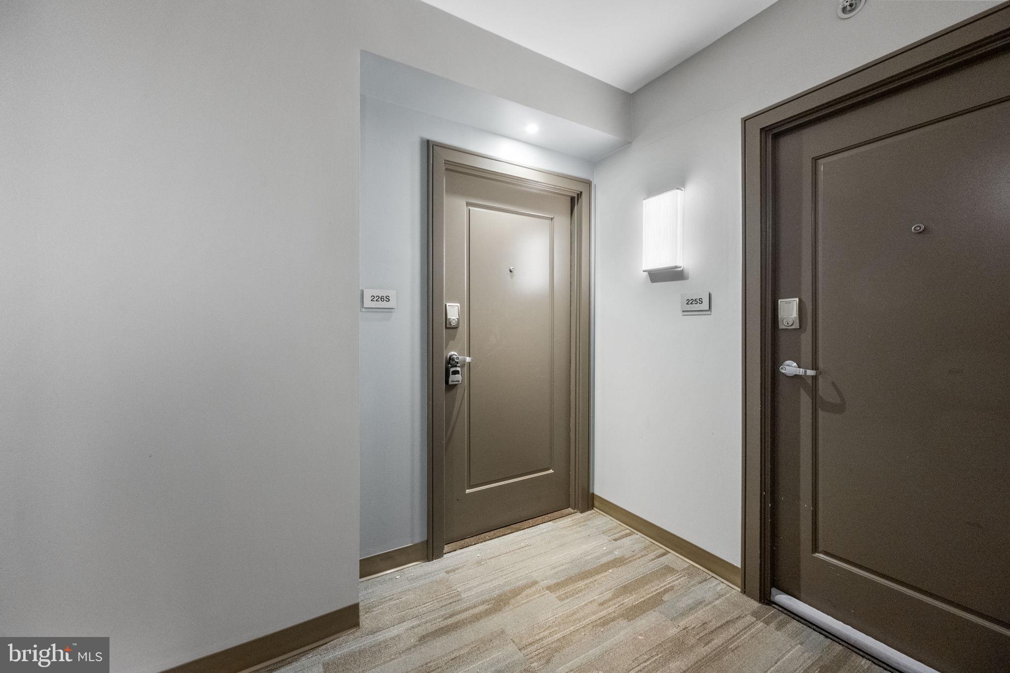 355 I Street Southwest, Unit 226 Washington, DC 20024 - Photo 5 of 23 a view of hallway with wooden floor
