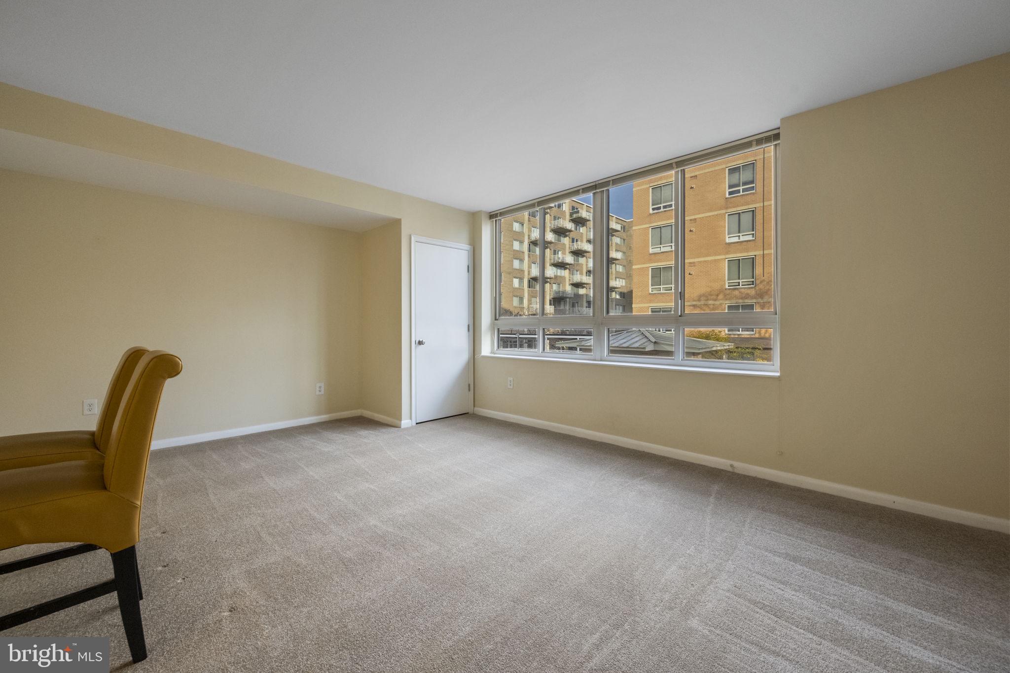 355 I Street Southwest, Unit 226 Washington, DC 20024 - Photo 8 of 23 a view of an empty room with a window