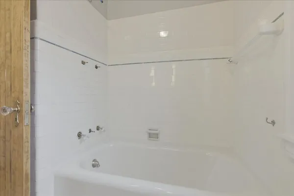 a bathroom with a bathtub