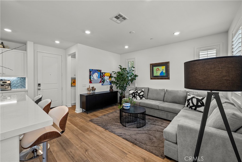 1663 Rosewell Road West Covina, CA 91791 - Photo 8 of 45 a living room with furniture and a flat screen tv