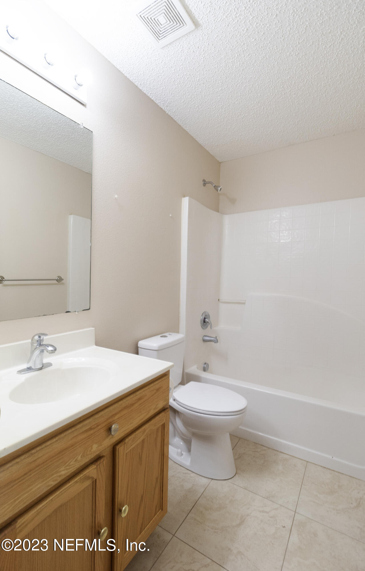 1490 Seawolf Trail Jacksonville, FL 32221 - Photo 27 of 36 a bathroom with a sink a toilet and a mirror