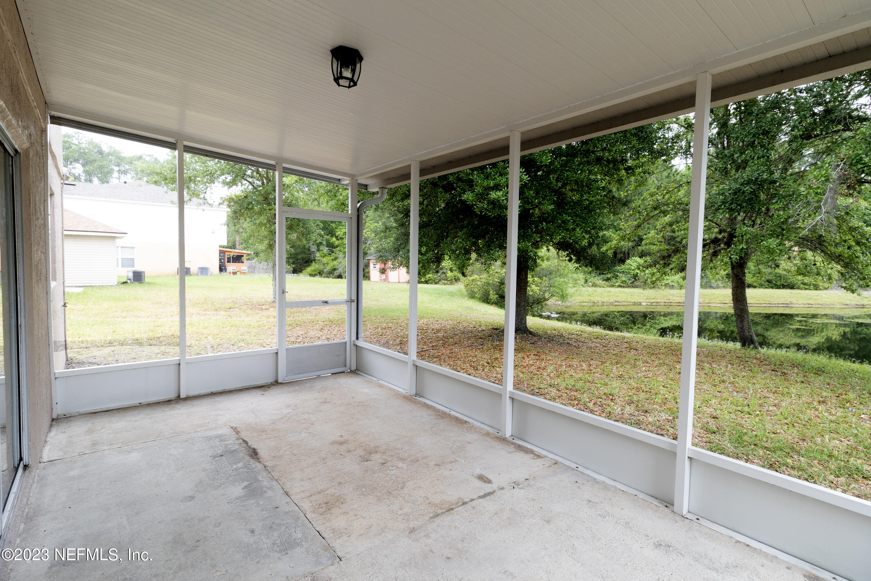 1490 Seawolf Trail Jacksonville, FL 32221 - Photo 31 of 36 a view of an empty room with large windows
