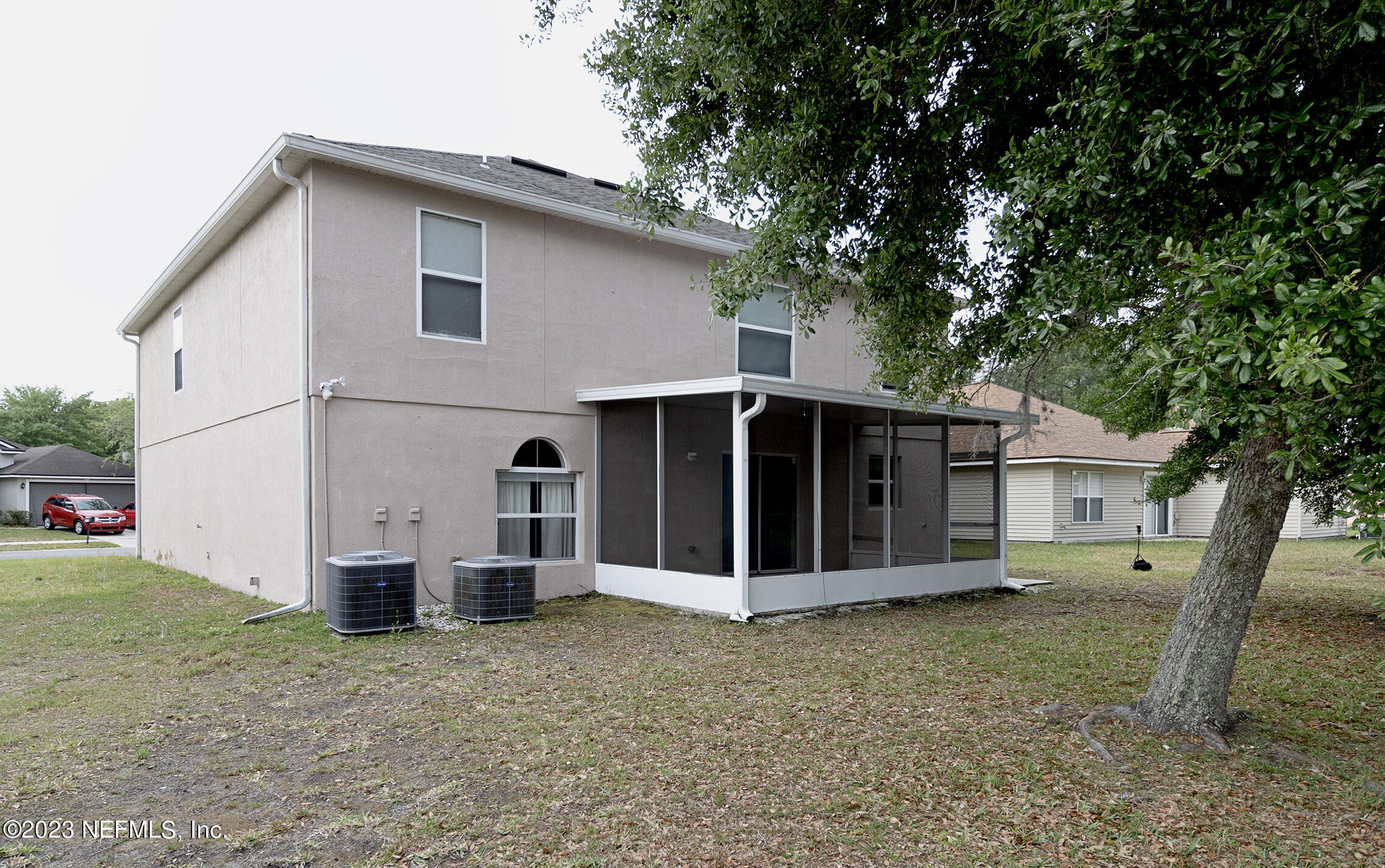1490 Seawolf Trail Jacksonville, FL 32221 - Photo 34 of 36 a view of a house with a yard and large tree