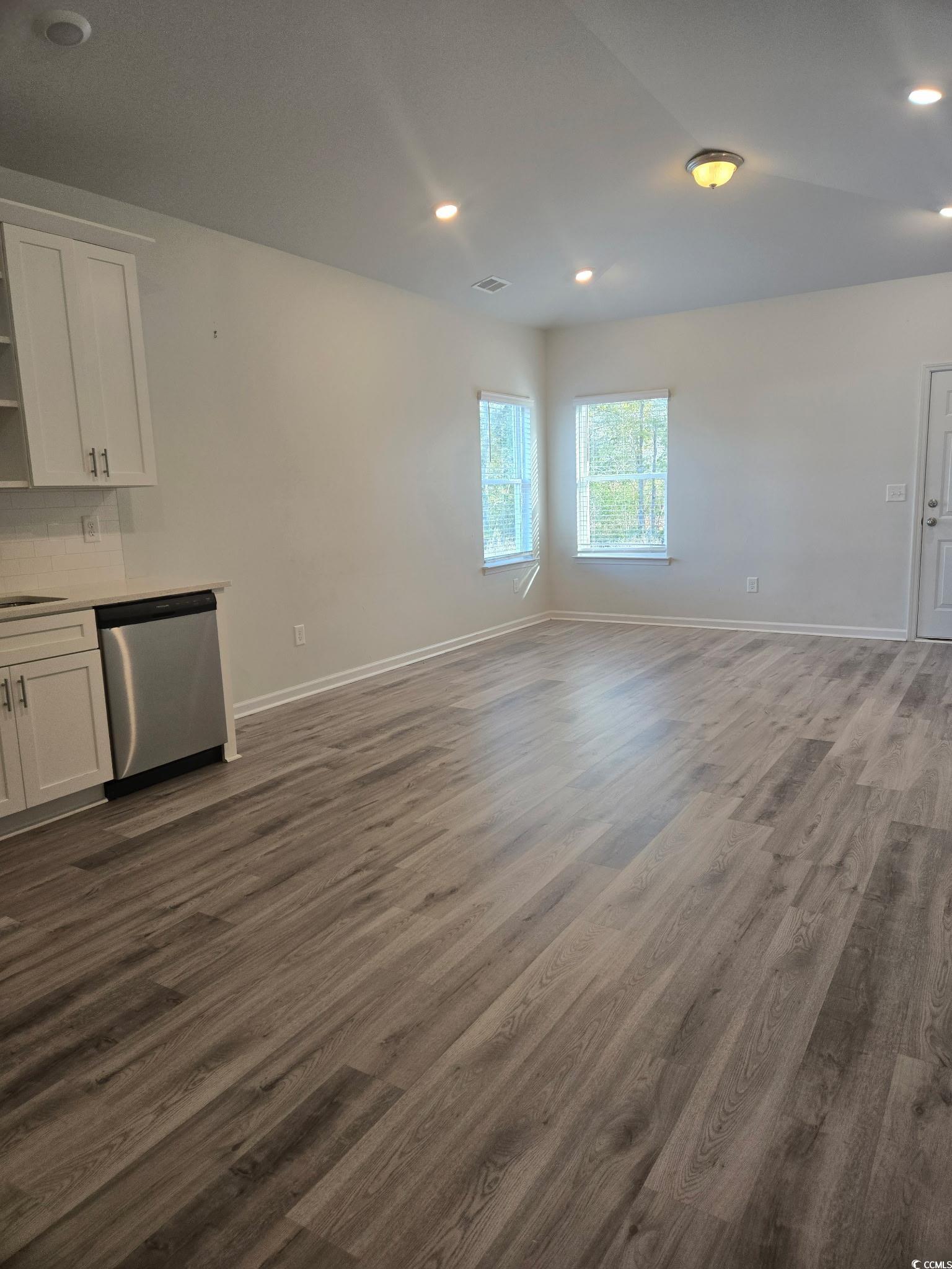 2027 6th Avenue Conway, SC 29526 - Photo 6 of 7 Unfurnished dining area featuring dark wood-style floors and recessed lighting