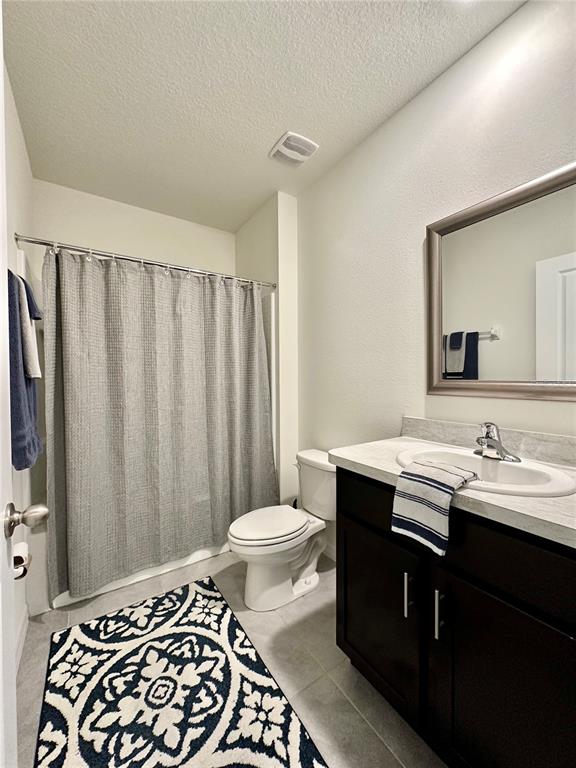 19 Hickory Course Radiel Ocala, FL 34472 - Photo 14 of 22 a bathroom with a double vanity sink toilet and a mirror
