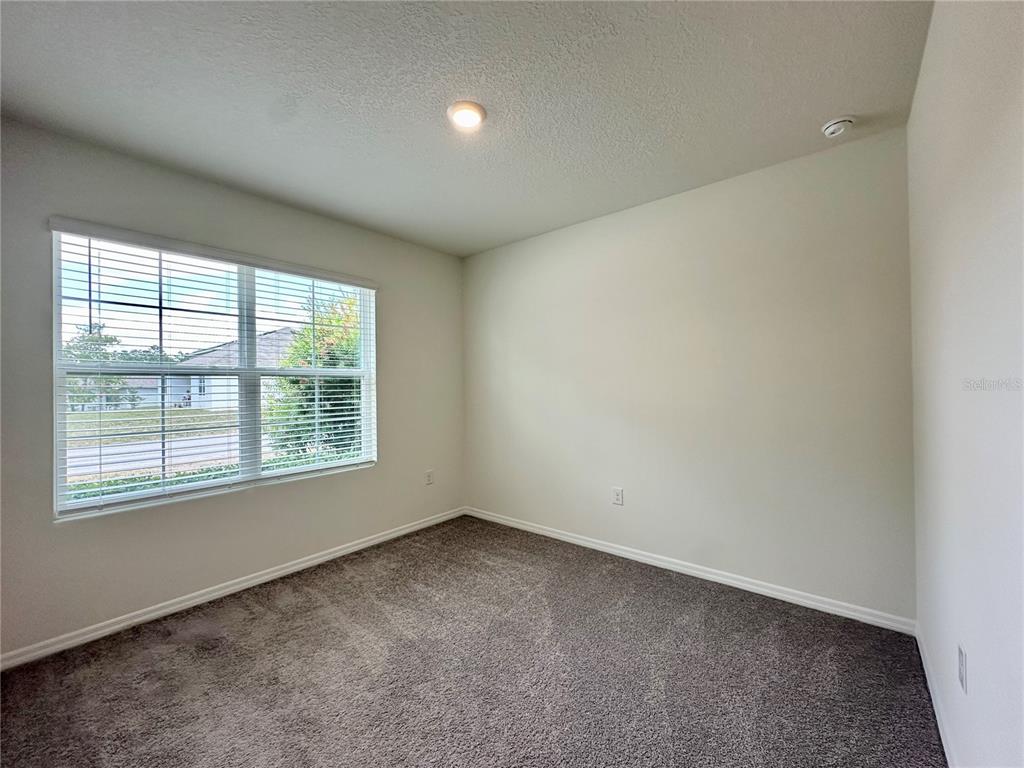 19 Hickory Course Radiel Ocala, FL 34472 - Photo 15 of 22 an empty room with a window