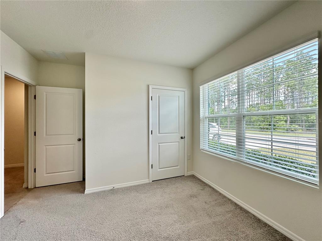 19 Hickory Course Radiel Ocala, FL 34472 - Photo 16 of 22 a view of an empty room with a window