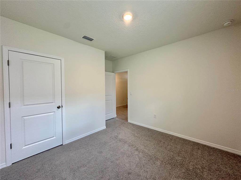 19 Hickory Course Radiel Ocala, FL 34472 - Photo 17 of 22 an empty room with an entryway