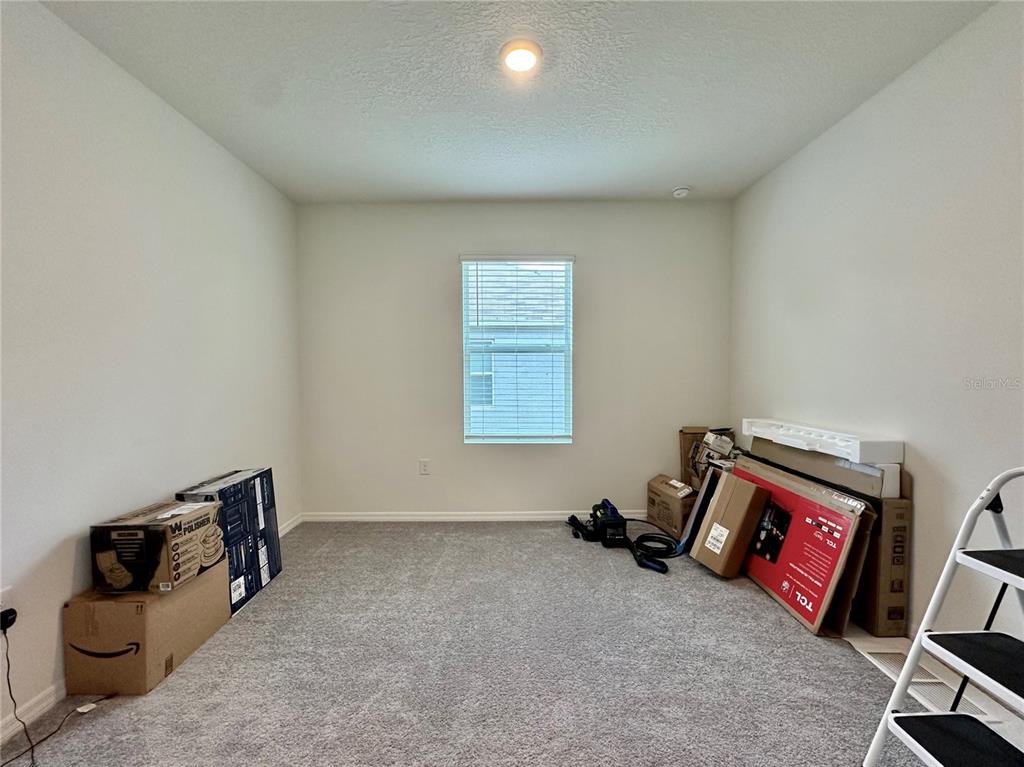 19 Hickory Course Radiel Ocala, FL 34472 - Photo 20 of 22 a view of a room with workspace and a window