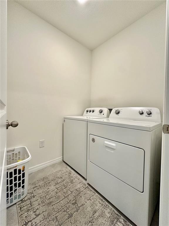 19 Hickory Course Radiel Ocala, FL 34472 - Photo 21 of 22 a utility room with dryer and washer