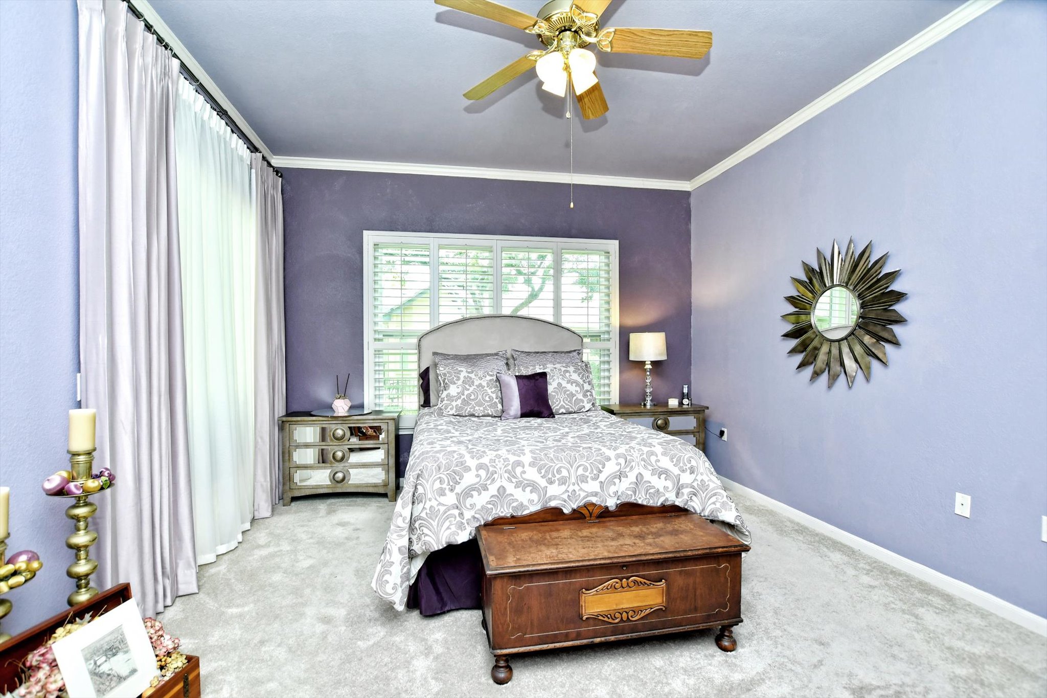 106 Nighthawk Way Georgetown, TX 78633 - Photo 14 of 29 Plush carpeting and crown molding enhance this inviting, well-lit bedroom.