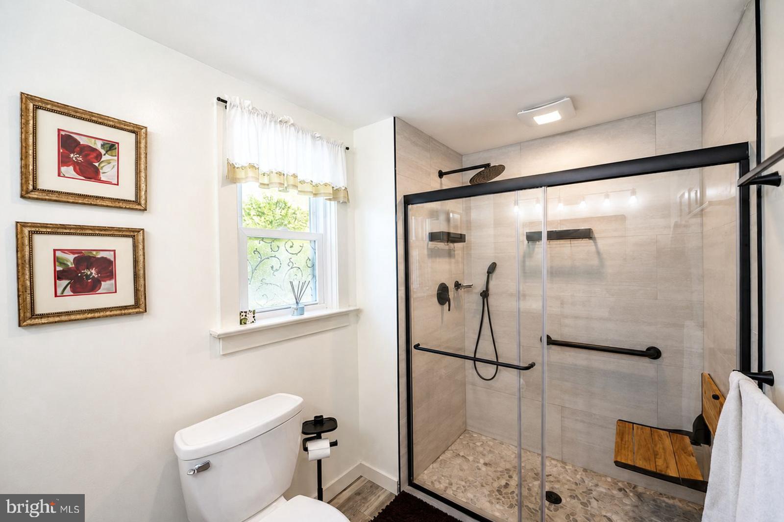 222 Blue School Road Perkasie, PA 18944 - Photo 28 of 77 a bathroom with a shower and toilet