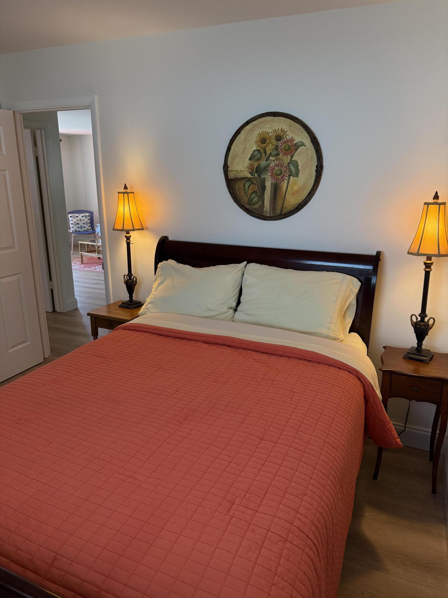 440 Southeast Fini Drive Stuart, FL 34996 - Photo 11 of 17 a bed sitting in a bedroom next to a window