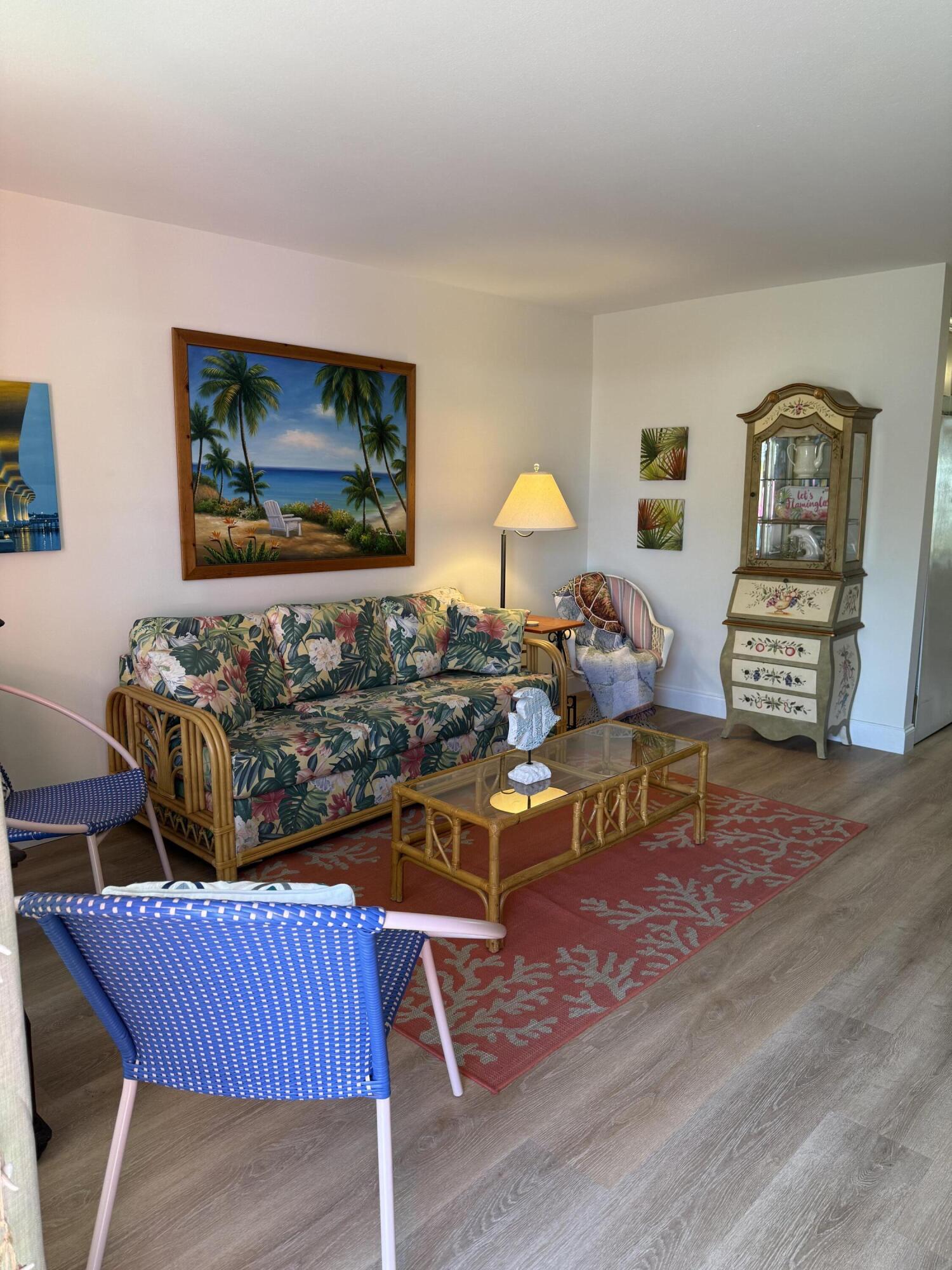 440 Southeast Fini Drive Stuart, FL 34996 - Photo 2 of 17 a living room with furniture and wooden floor