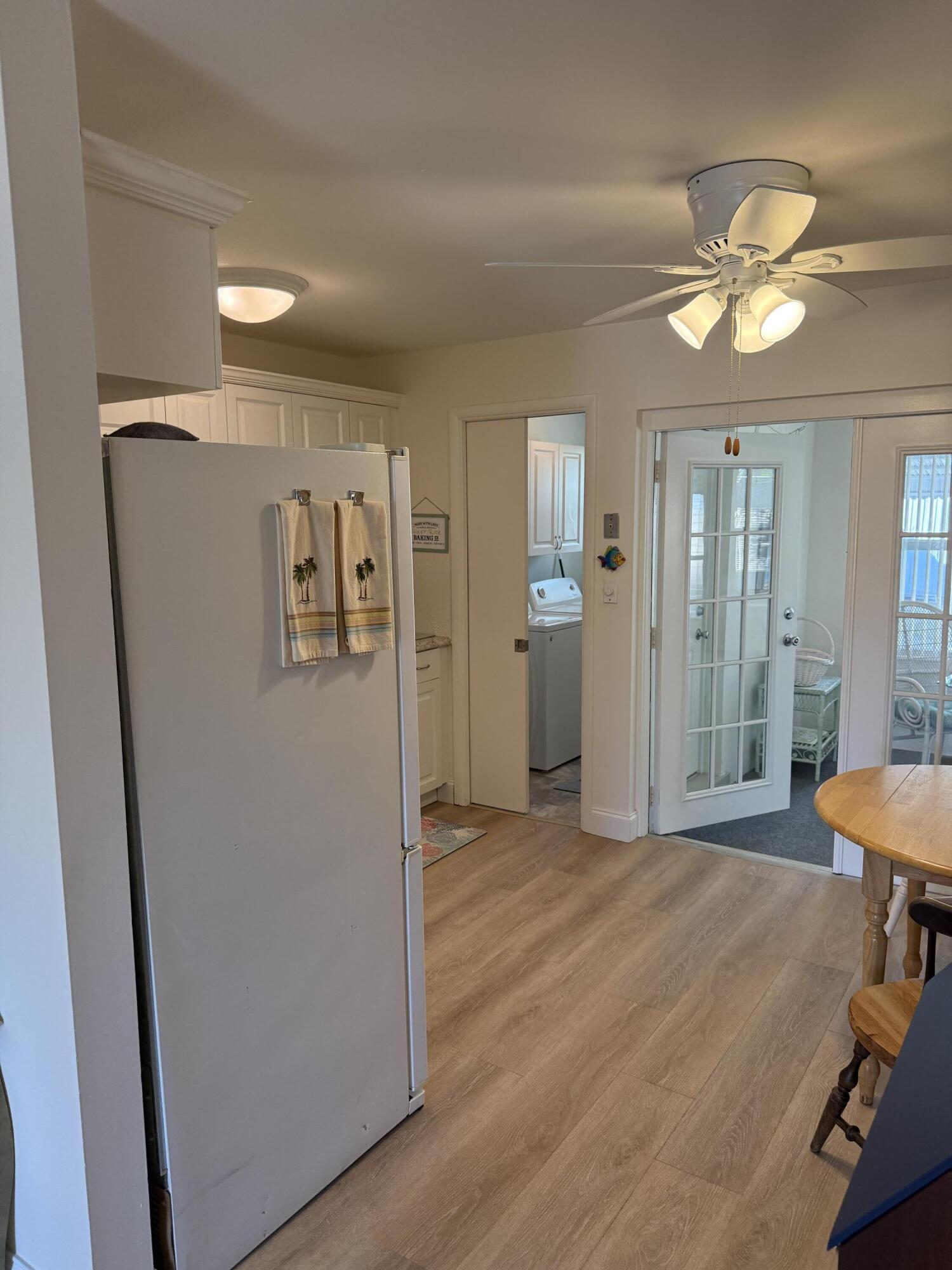440 Southeast Fini Drive Stuart, FL 34996 - Photo 5 of 17 a view of a livingroom with a chandelier