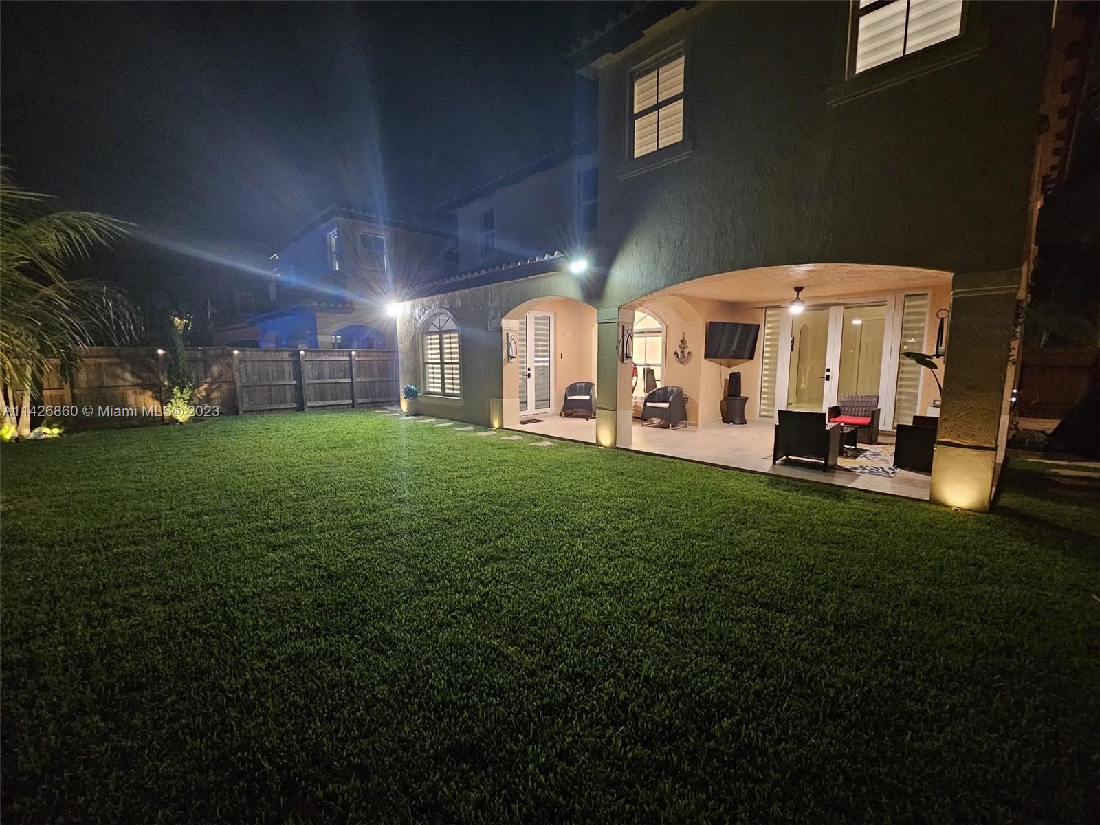 3166 Southwest 155th Avenue Miami, FL 33185 - Photo 27 of 27 a view of a big room with staircase and a yard