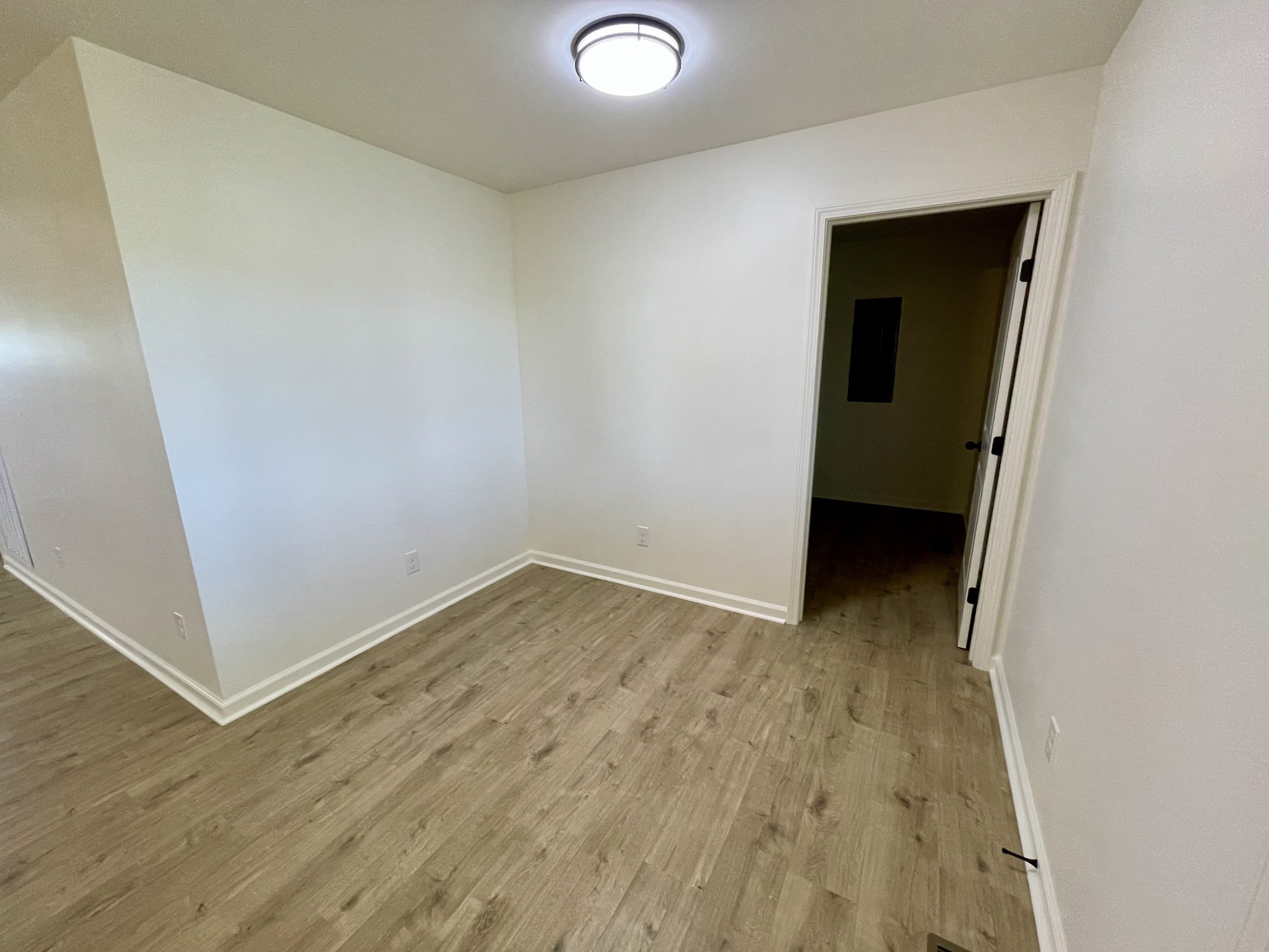 104 Donald Road Lafayette, TN 37083 - Photo 12 of 22 an empty room with wooden floor and closet