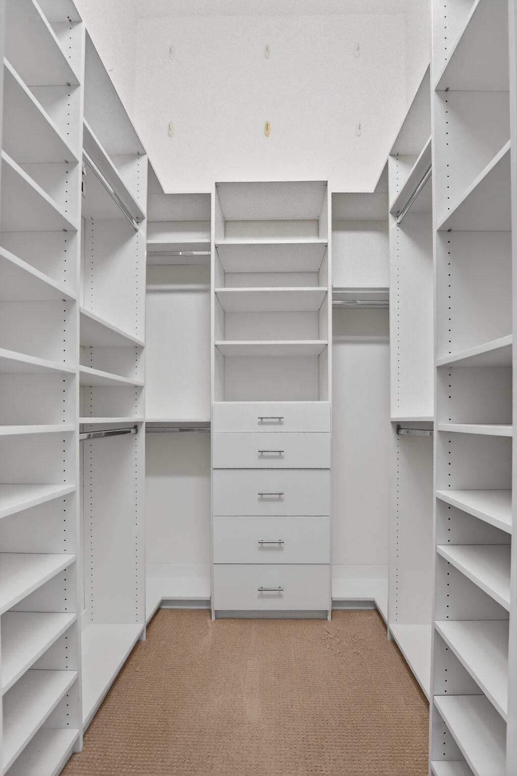 21719 Marigot Drive Boca Raton, FL 33428 - Photo 18 of 53 a view of an empty walk in closet