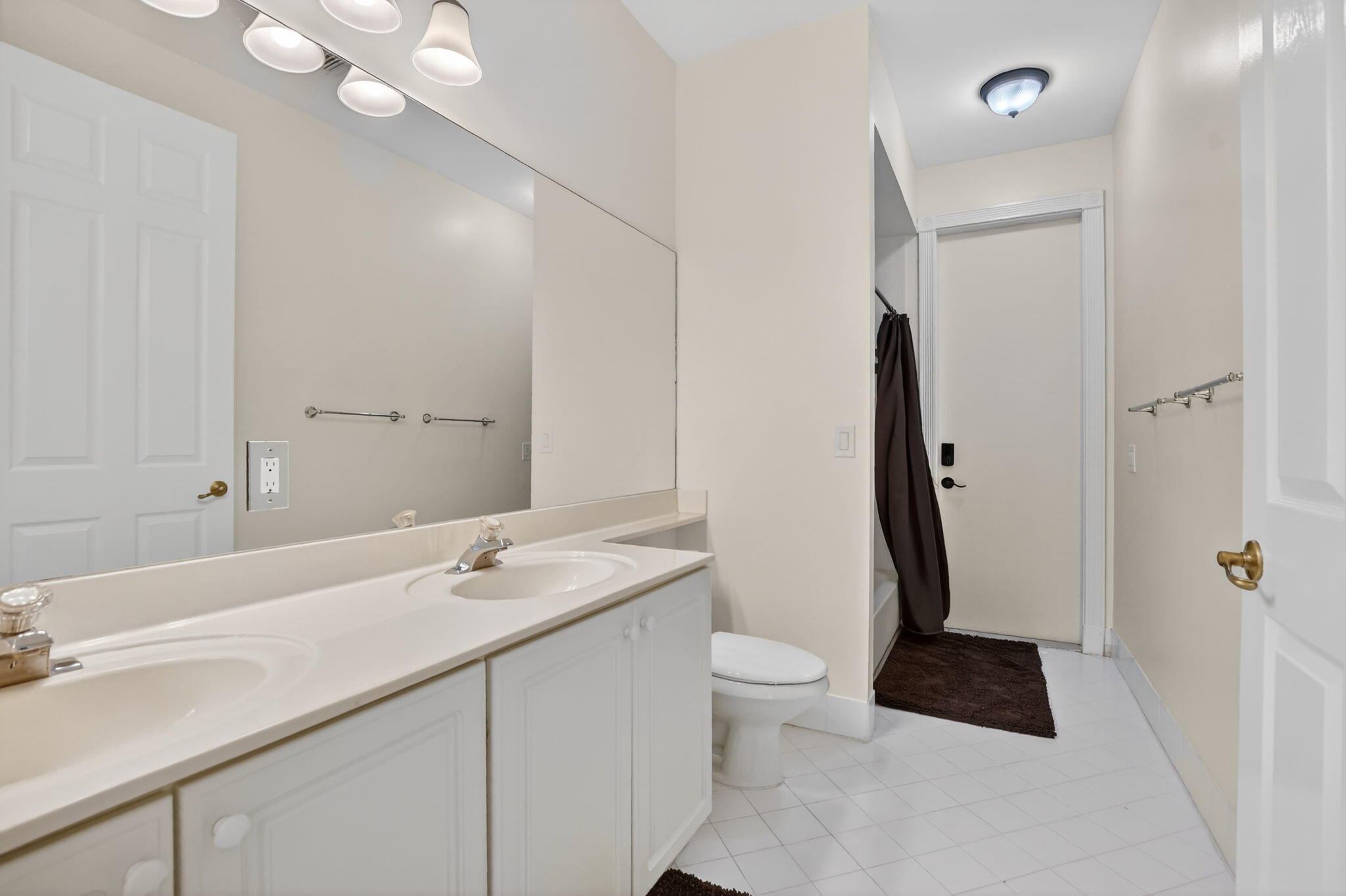 21719 Marigot Drive Boca Raton, FL 33428 - Photo 25 of 53 Bathroom 3 with door to the pool area