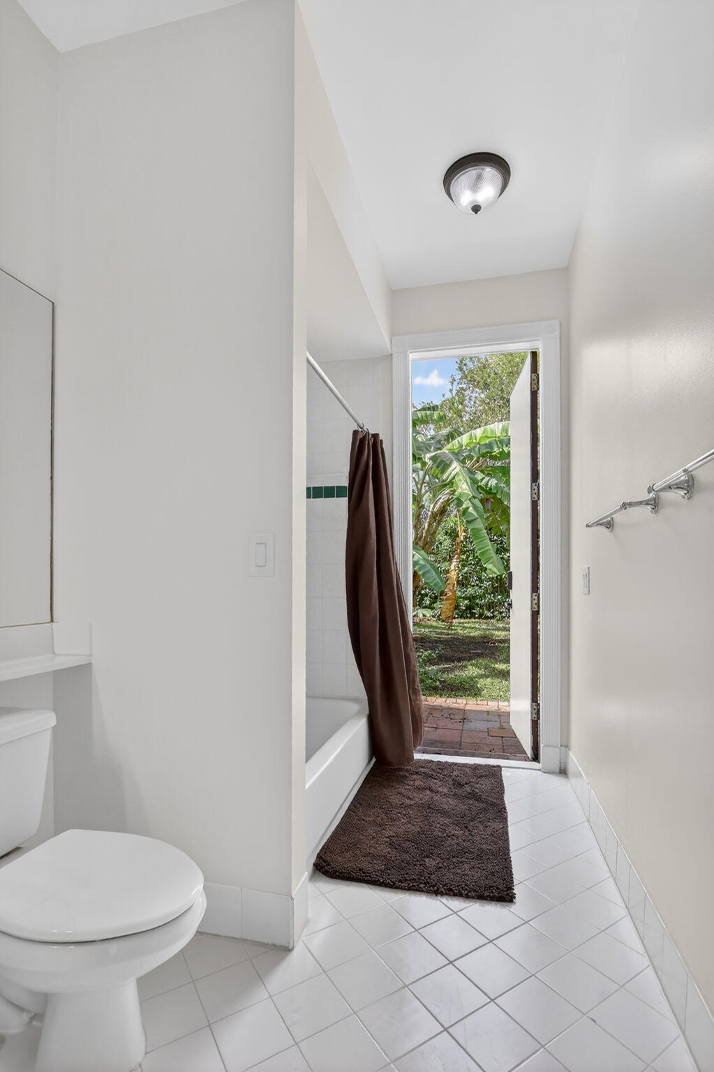 21719 Marigot Drive Boca Raton, FL 33428 - Photo 26 of 53 Leading to the Pool and Garden Area