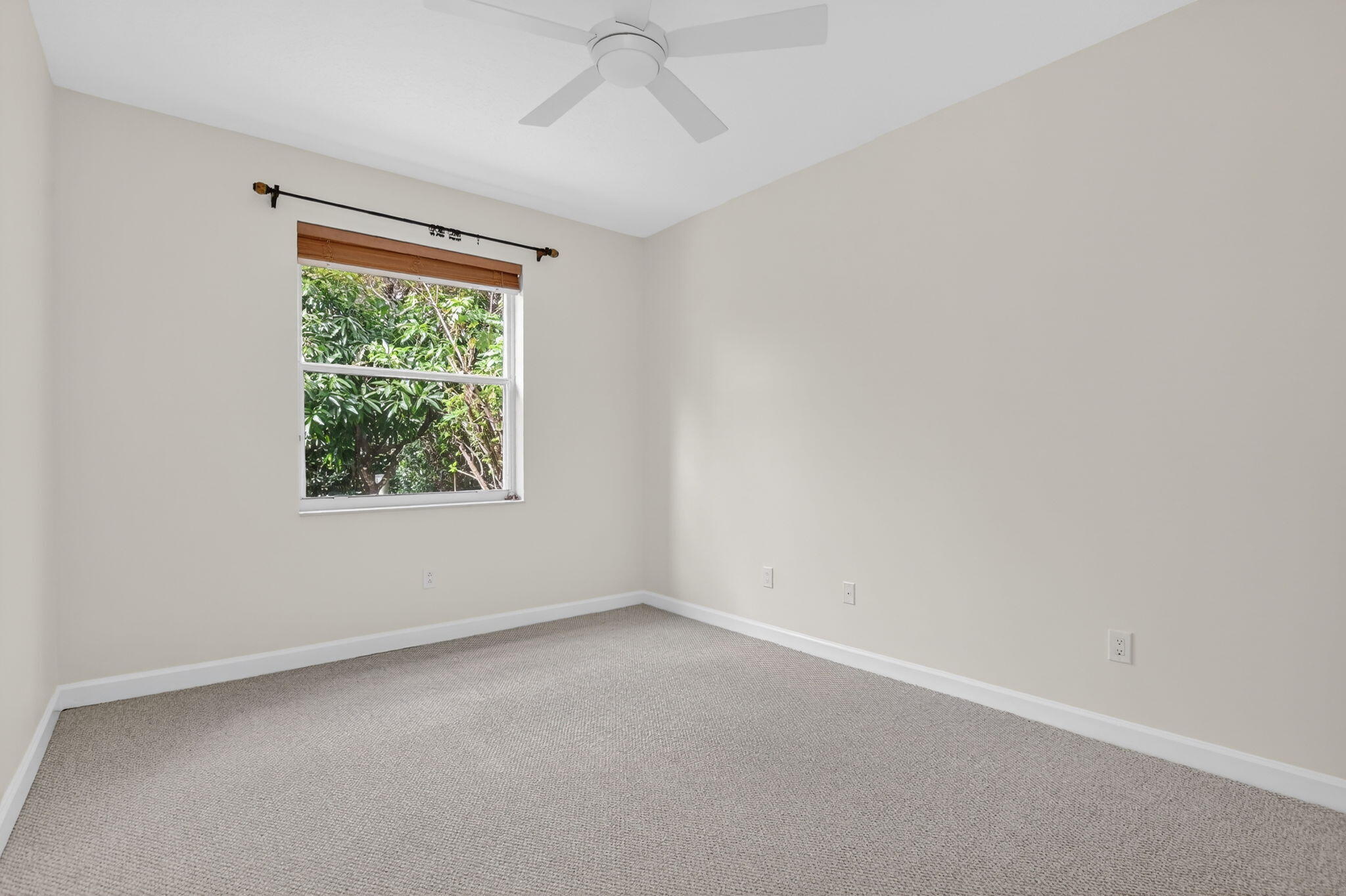 21719 Marigot Drive Boca Raton, FL 33428 - Photo 27 of 53 an empty room with a window
