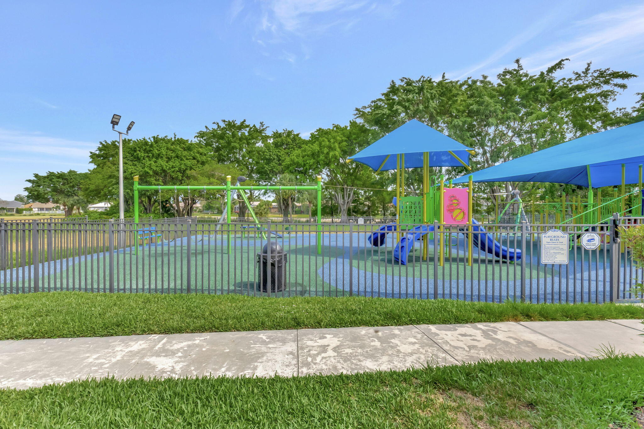 21719 Marigot Drive Boca Raton, FL 33428 - Photo 48 of 53 a view of a garden and a fence