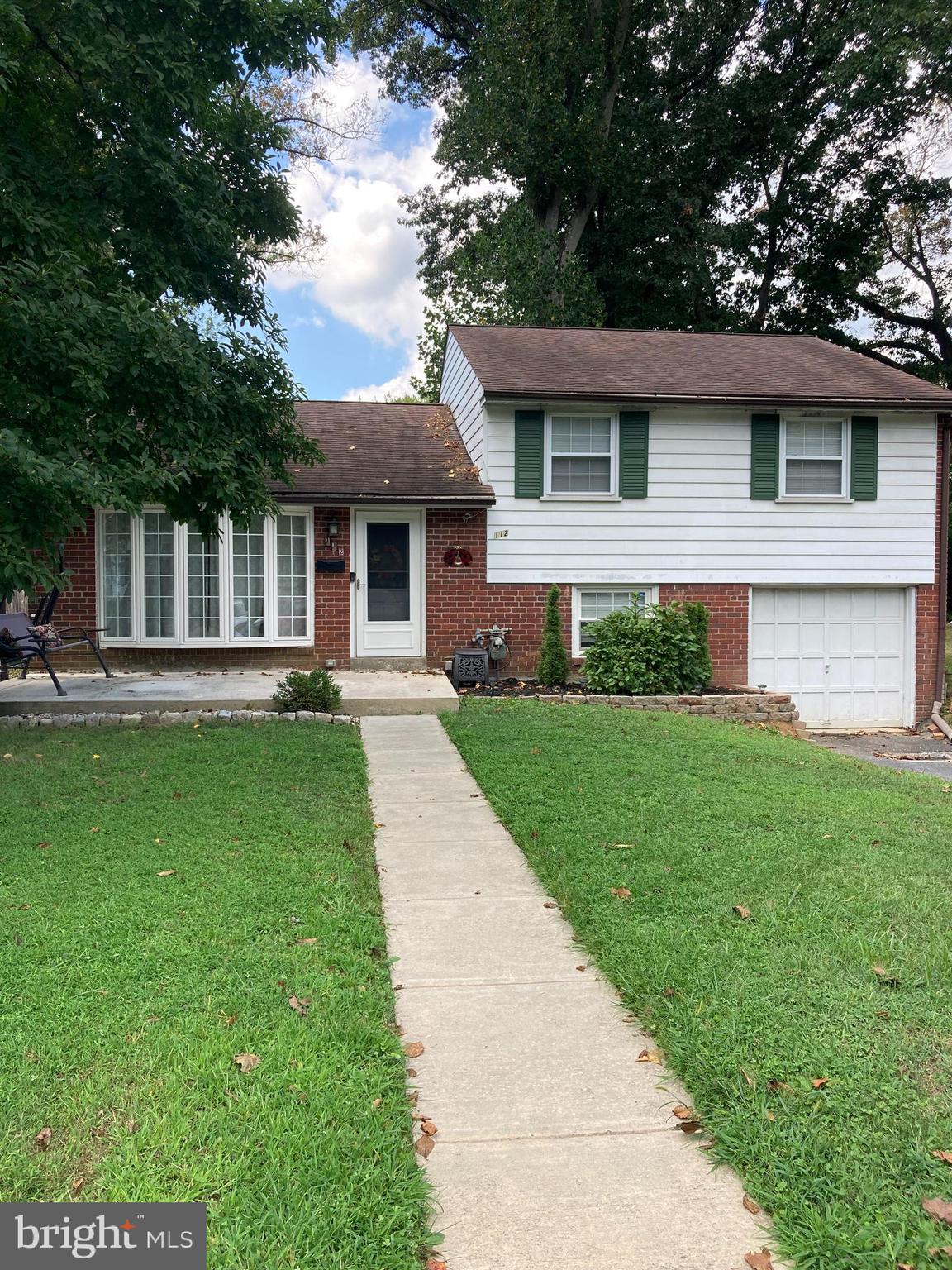 112 Gleaves Road Springfield, PA 19064 - Photo 2 of 27 Exterior Front with Patio, Driveway