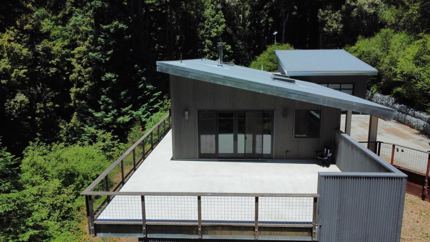 545 Flume Road Aptos, CA 95003 - Photo 18 of 24 a view of a small house with a tree