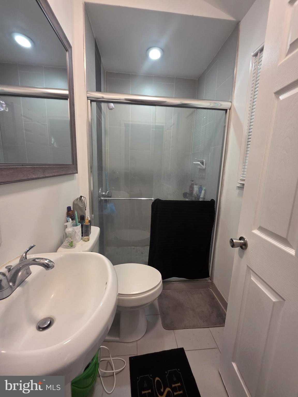 4047 Spring Garden Street, Unit 1 Philadelphia, PA 19104 - Photo 11 of 12 Ensuite bathroom with 3rd bedroom