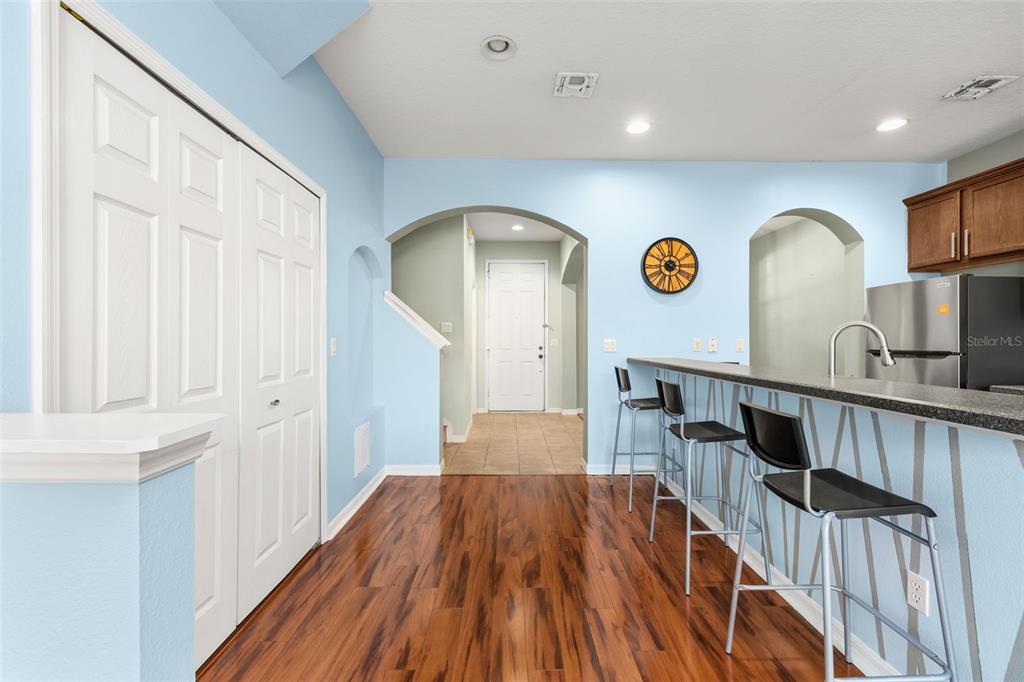 11781 Fitzgerald Butler Road Orlando, FL 32836 - Photo 11 of 37 a view of a livingroom with wooden floor