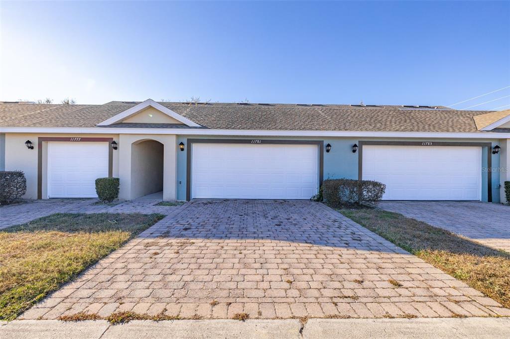 11781 Fitzgerald Butler Road Orlando, FL 32836 - Photo 33 of 37 a front view of a house with a yard
