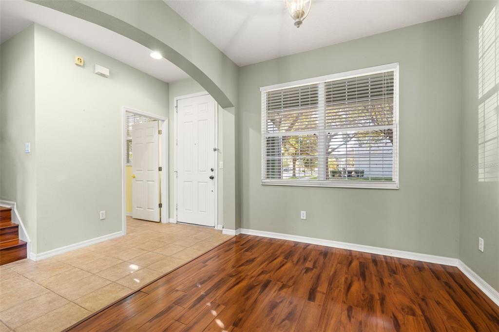 11781 Fitzgerald Butler Road Orlando, FL 32836 - Photo 5 of 37 a bedroom with a bed and a window