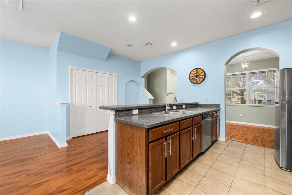 11781 Fitzgerald Butler Road Orlando, FL 32836 - Photo 9 of 37 a kitchen with a stove and a sink
