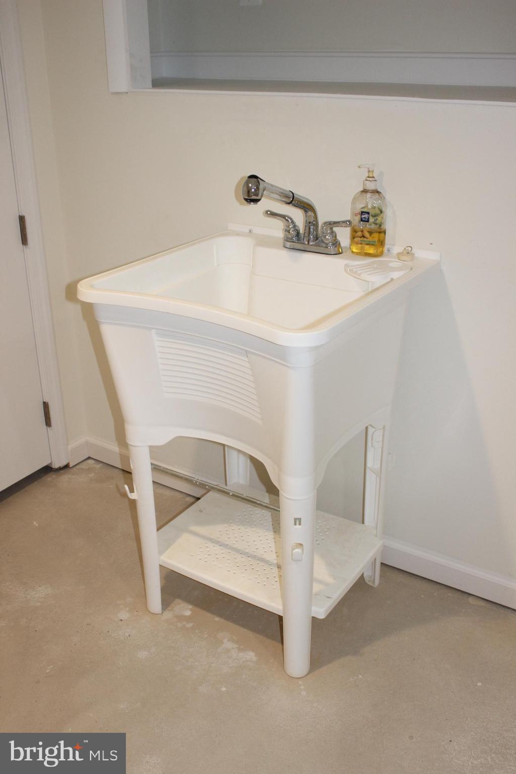 1907 Madison Road Baltimore, MD 21222 - Photo 32 of 47 Basement utility sink.